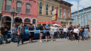 Part of Buffalo Street was closed off Sunday to accommodate a large gathering outside of Rex's for a ribbon cutting. News Now Warsaw photo by Dan Spalding